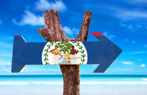 Belize Flag Wooden Sign With Beach Background