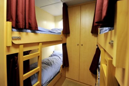 Class Afloat cabin aboard the Alex II tall ship. Students live aboard the ship, as they travel and study abroad.